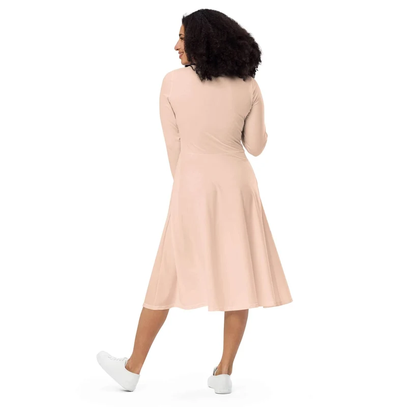 Peach Midi Dress with Pockets: Soft Elegance and Everyday Comfort.