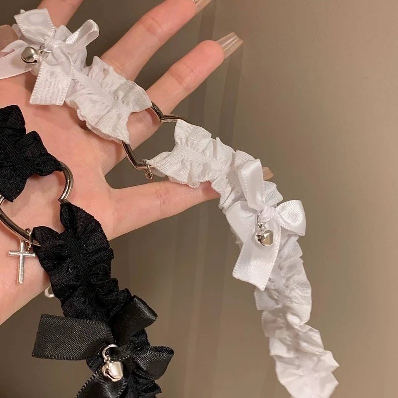 Gothic-Strumpfband aus Spitze mit Schleife und Glöckchen für Damen
