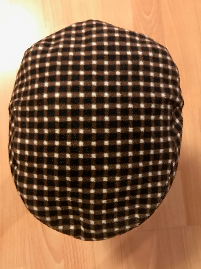 Schiebermütze kariert braun/weiß – Größe 56