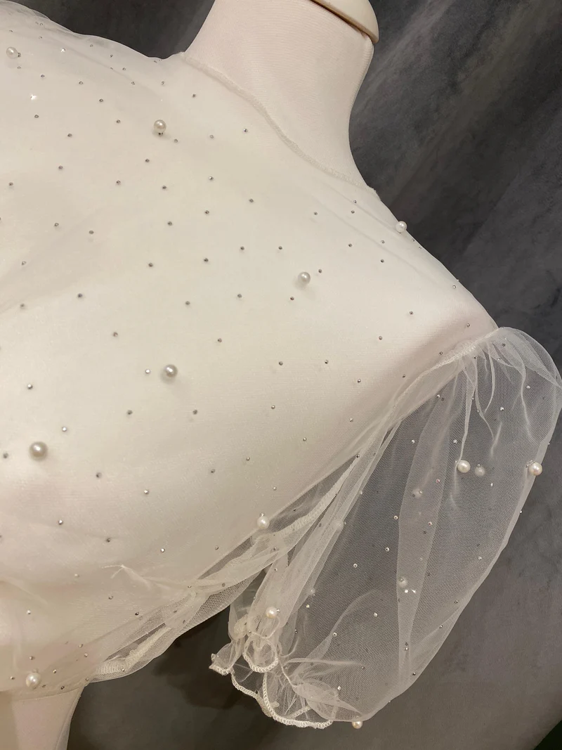Dirndlbluse Marjo Geldersheim mit Perlen