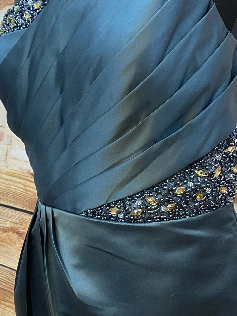 Cocktailkleid asymmetrisch türkis grün Unique Gr. 42