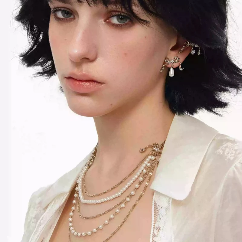 Grunge-Perlenkette mit Schleife und Perlenbesatz für Damen