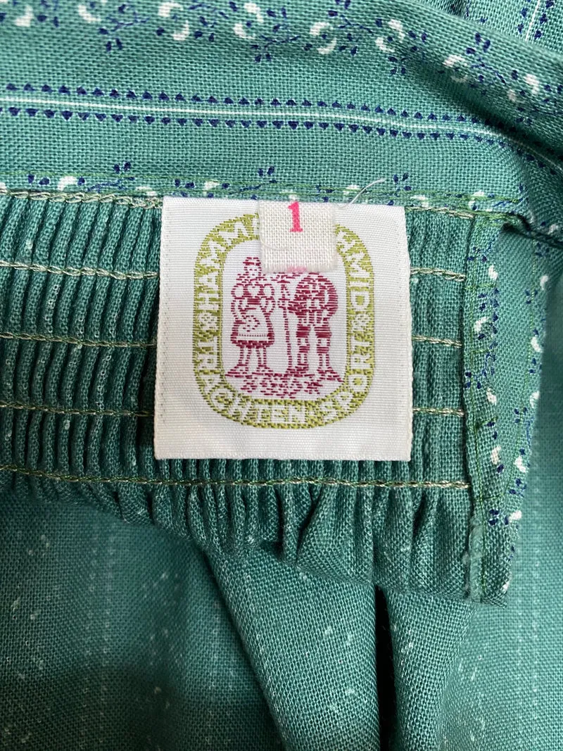 Vintage Dirndlschürze grün - gemustert, mittellang