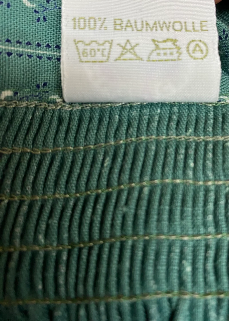 Vintage Dirndlschürze grün - gemustert, mittellang